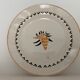 7 dessert plates and one Longwy dish