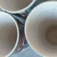 X5 enamelled ceramic mugs with abstract 60s decor