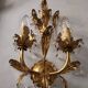 Hand-forged wall lamp gilded with gold leaf and crystals, Italy