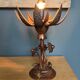 Art Deco wooden lamp with hand-carved lotus flower.