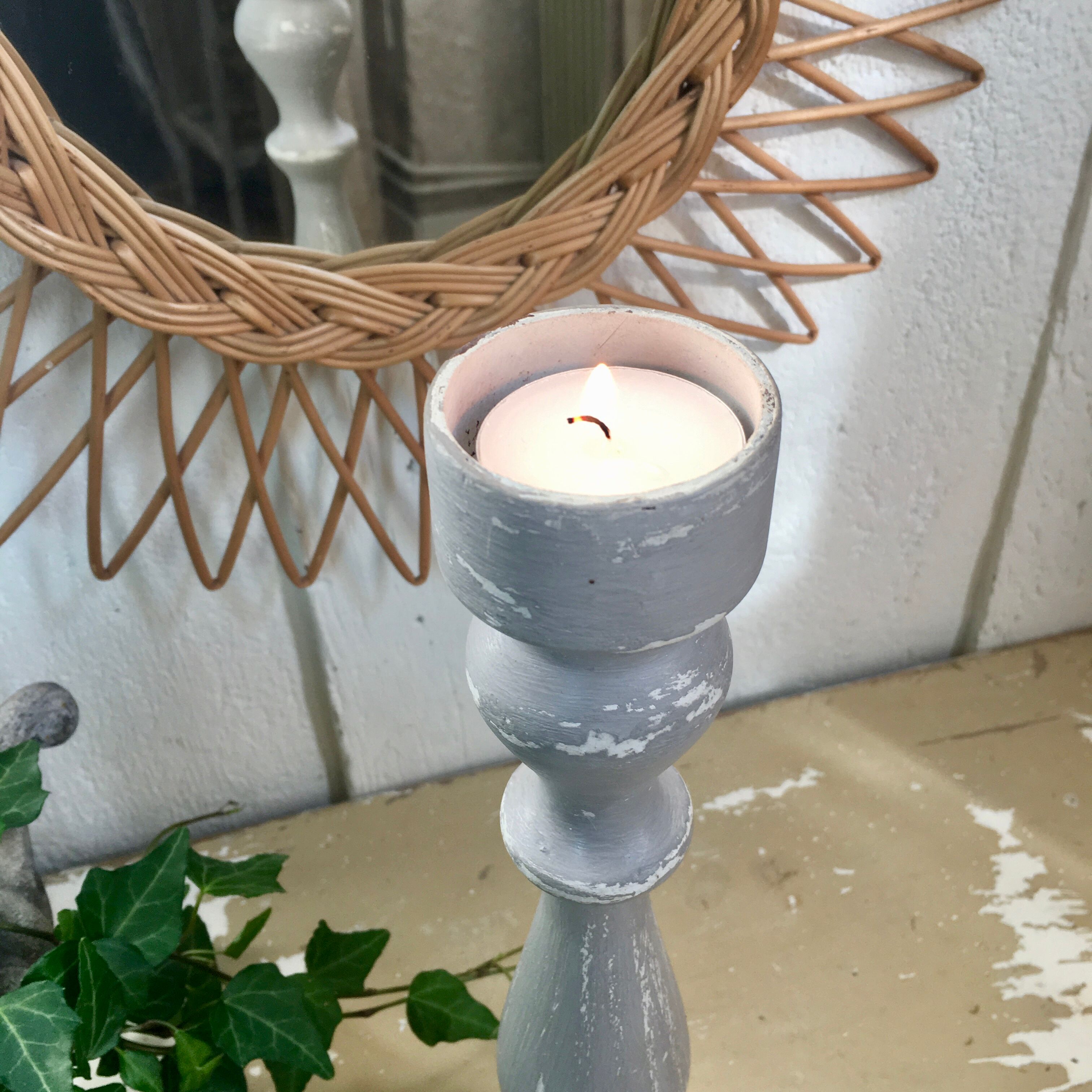 Old gray wood candlestick