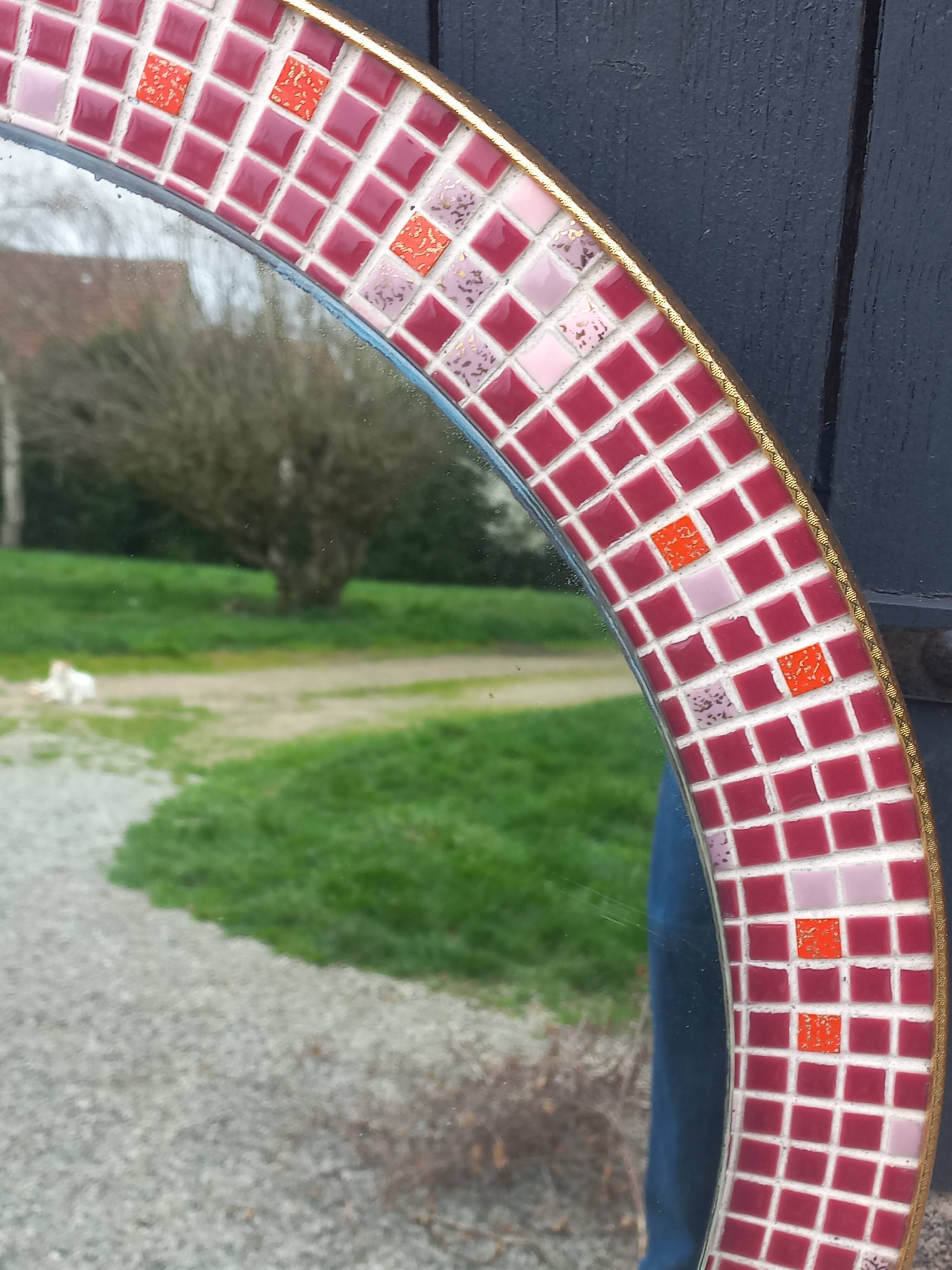 Vintage ceramic mirror from the 1960s.