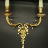 Pair of large Louis XVI style sconces with male faces - bronze