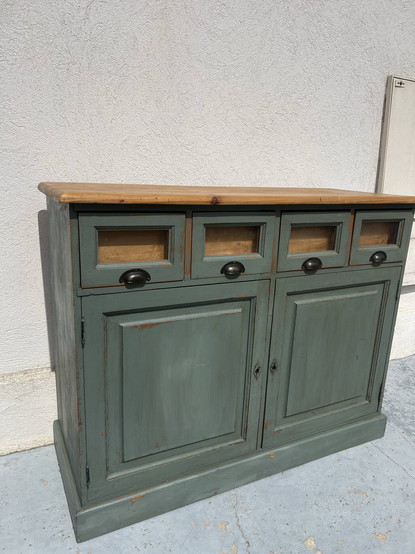 Antique counter cabinet with drawers and label holders – green patina