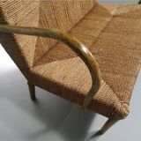 Vintage French papercord sofa with a metal frame base