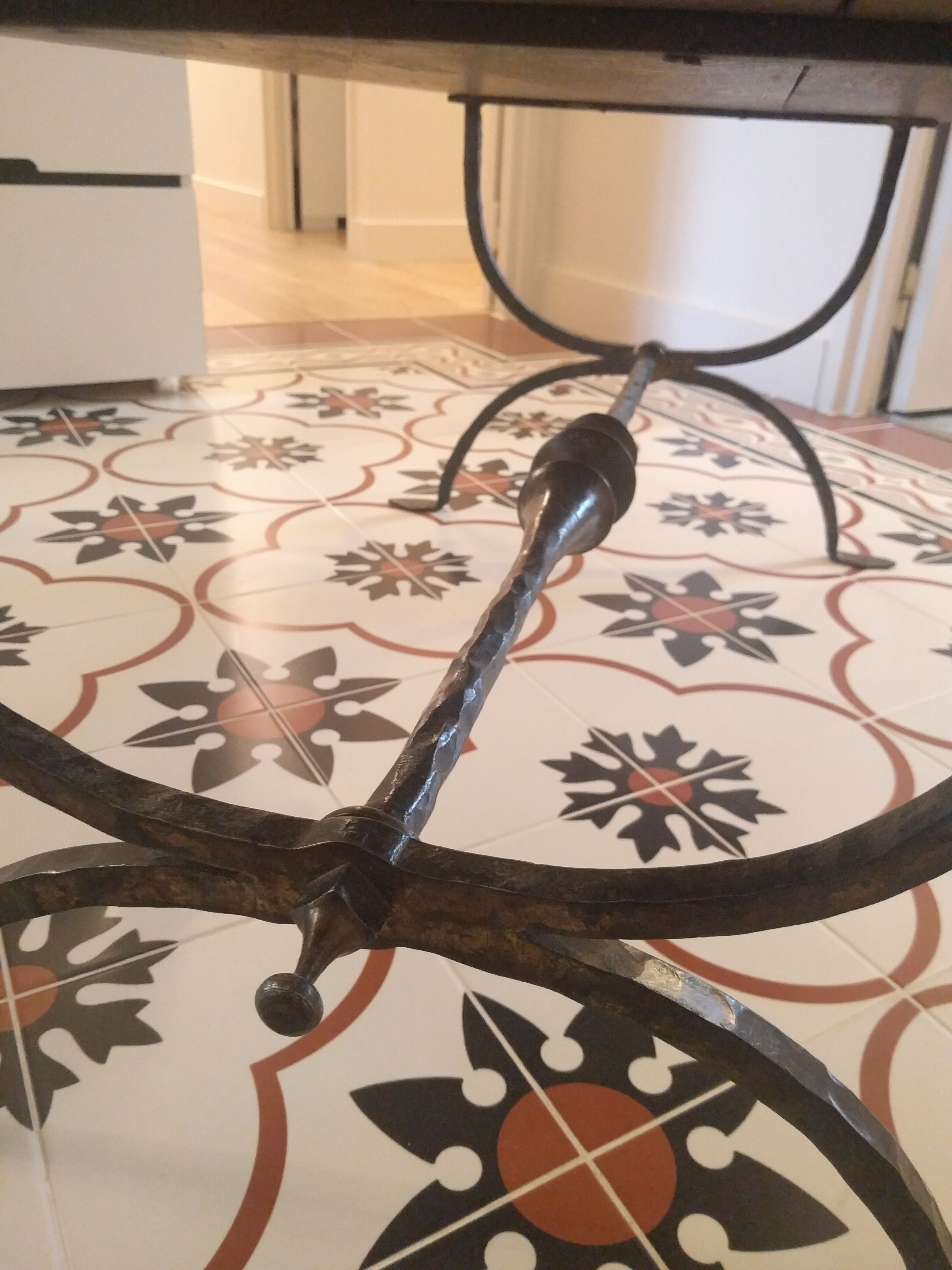 Coffee table, wooden top, wrought iron legs
