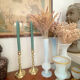 Pair of twisted solid brass candle holders