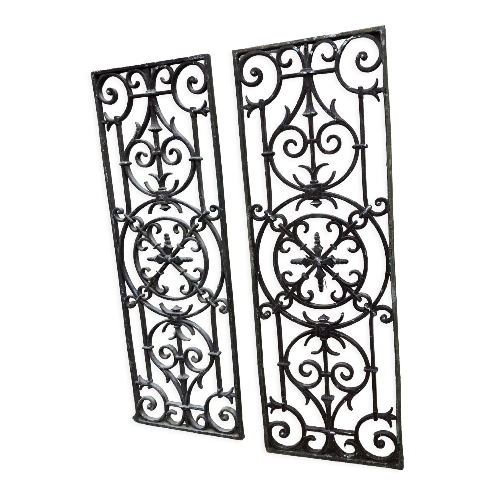 Pair of old cast iron door grilles