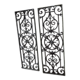 Pair of old cast iron door grilles