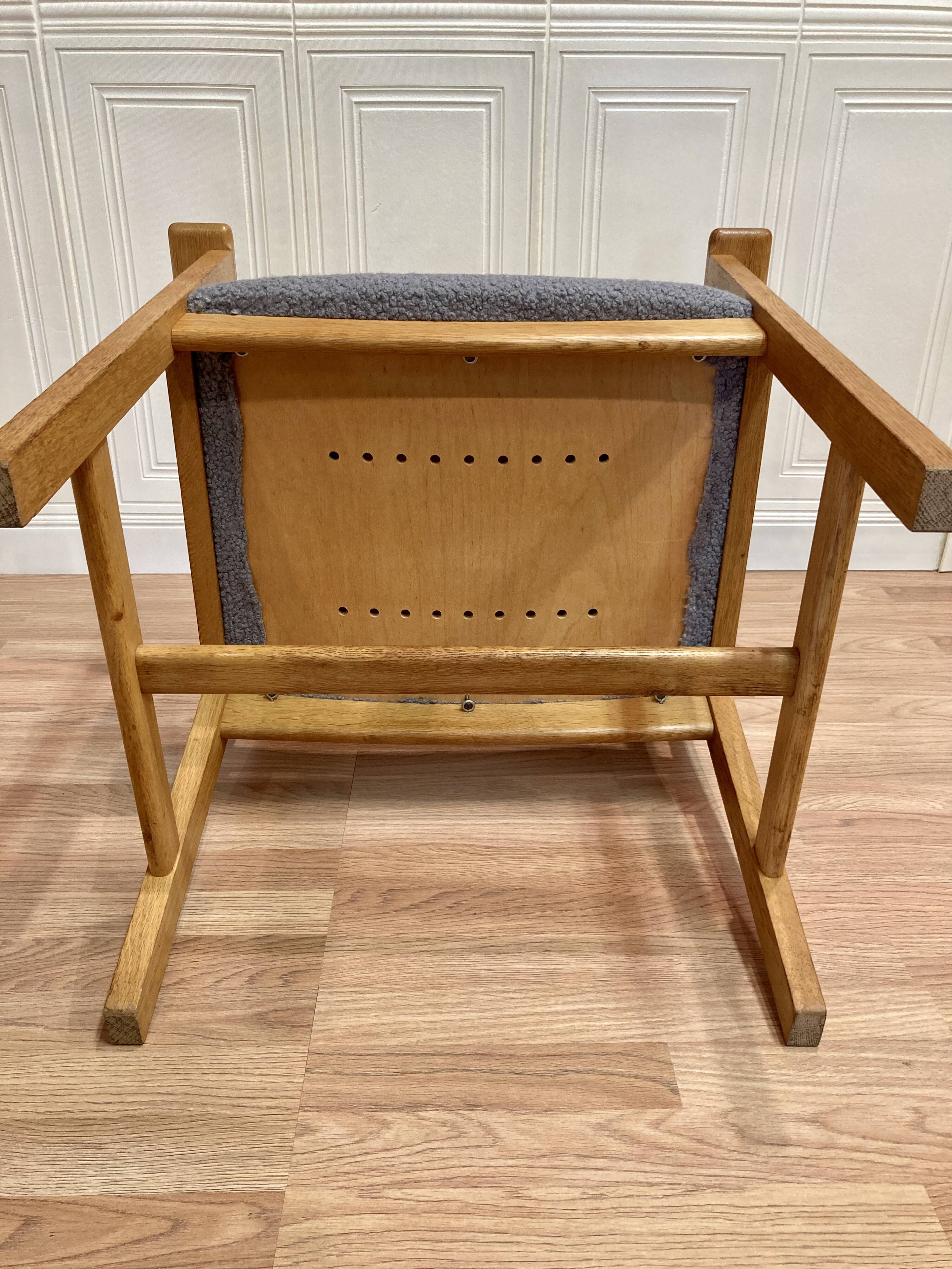 A pair of armchairs stamped "hans wegner" 1960.