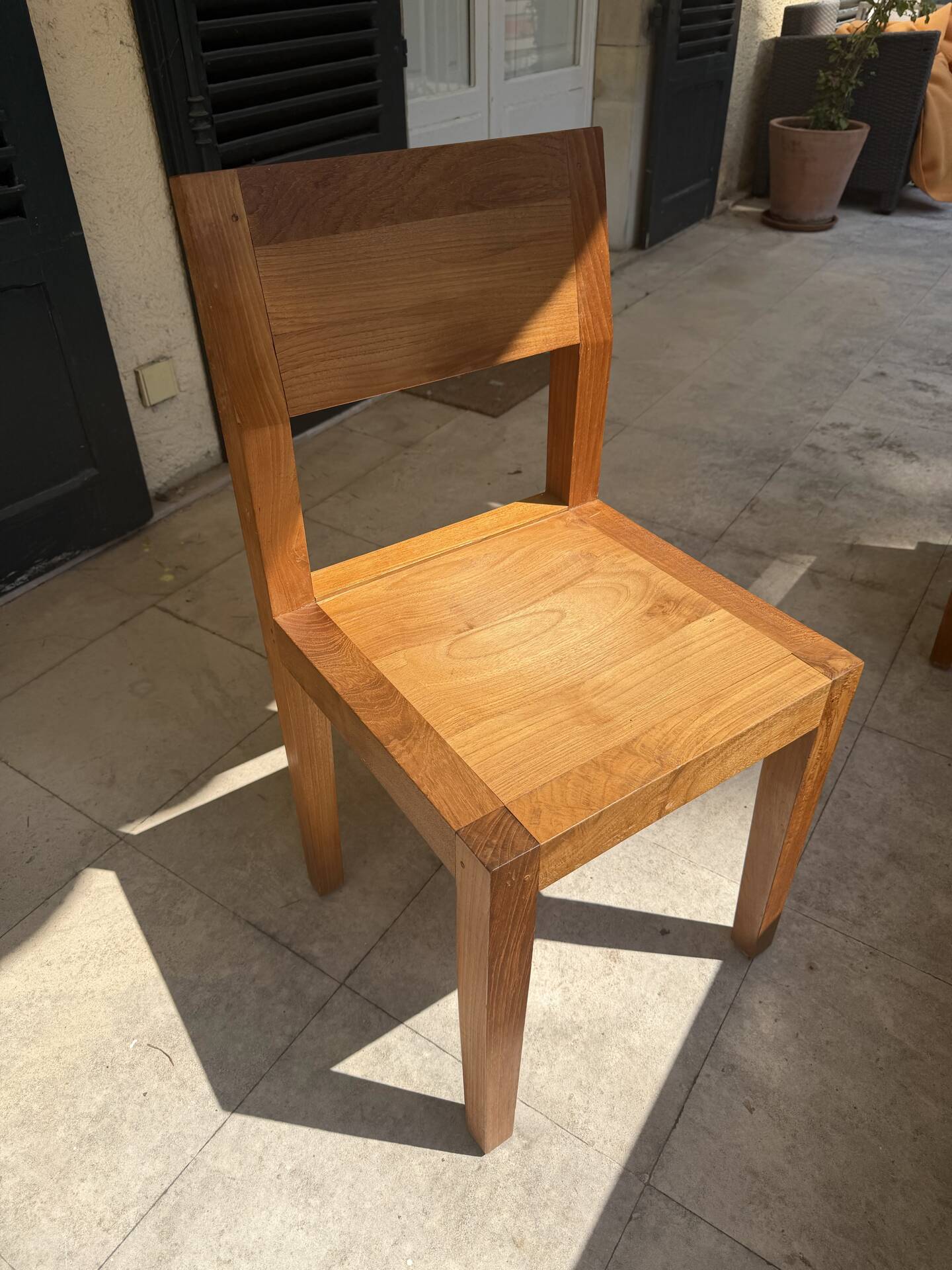 Set of 4 Ethnicraft teak chairs