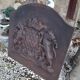 Plaque de cheminée en fonte décors aux lions