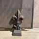 Fireplace screen in metal with cast iron fleur-de-lis.