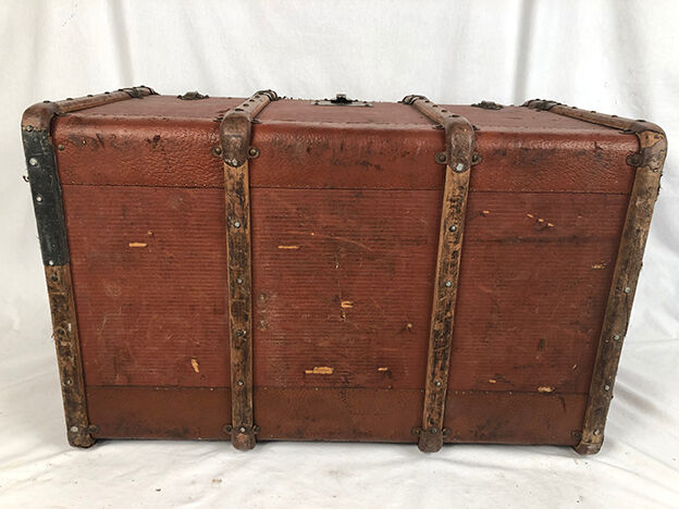 Old travel trunk cardboard, fabric and leather
