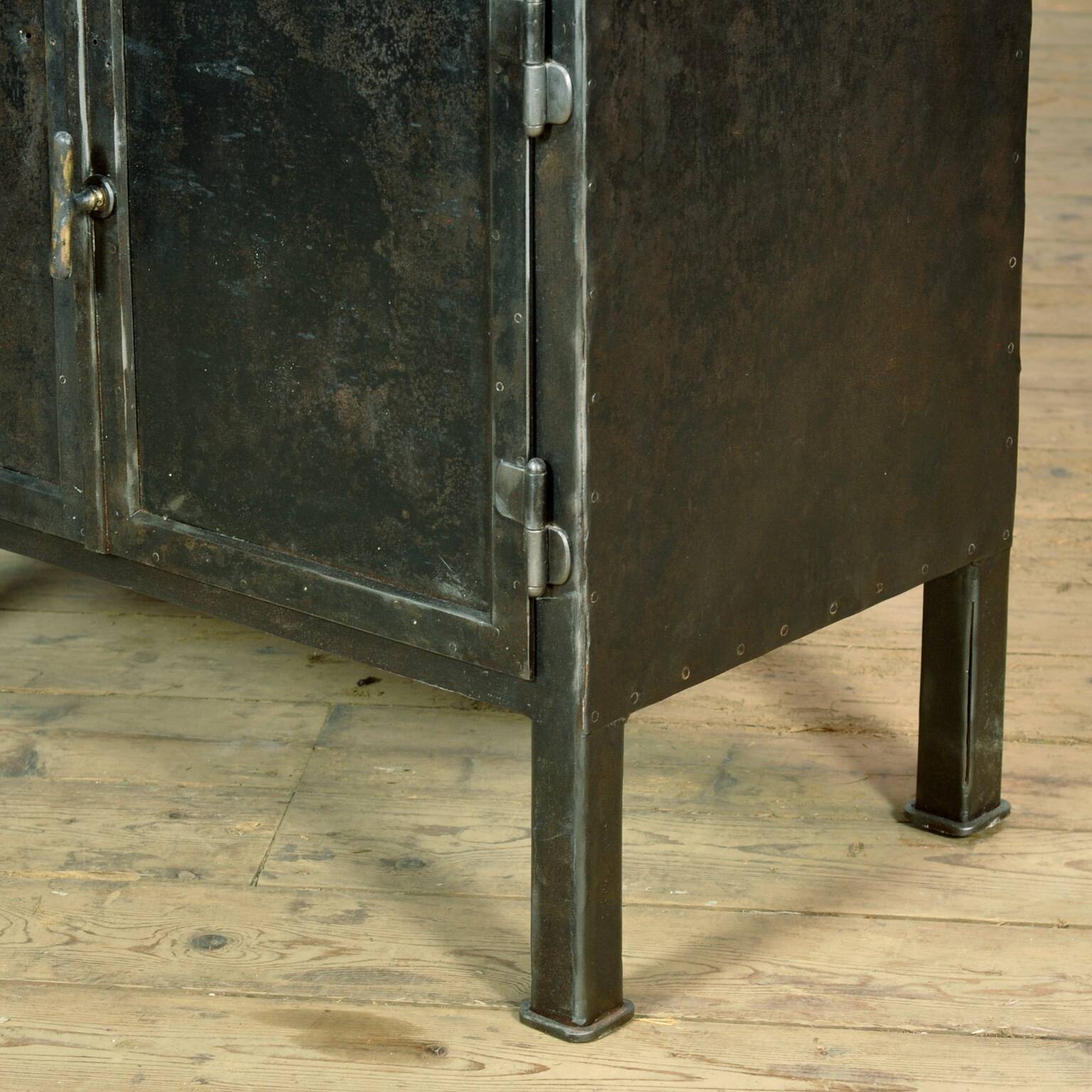 Polished iron medical cabinet, 1920s