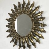 Miroir soleil métal doré