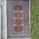 Vintage hand knotted rug with geometric patterns on a grey/beige/terracotta background 170 x 96 cm