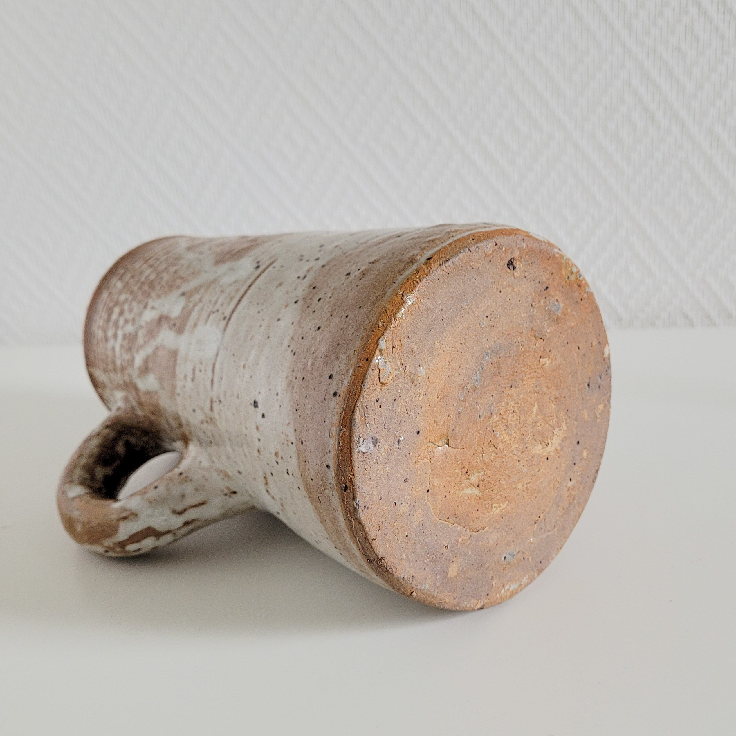 Glazed stoneware pitcher