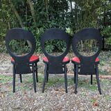 6 vintage Baumann seagull model chairs, black lacquered with red Skai seats.