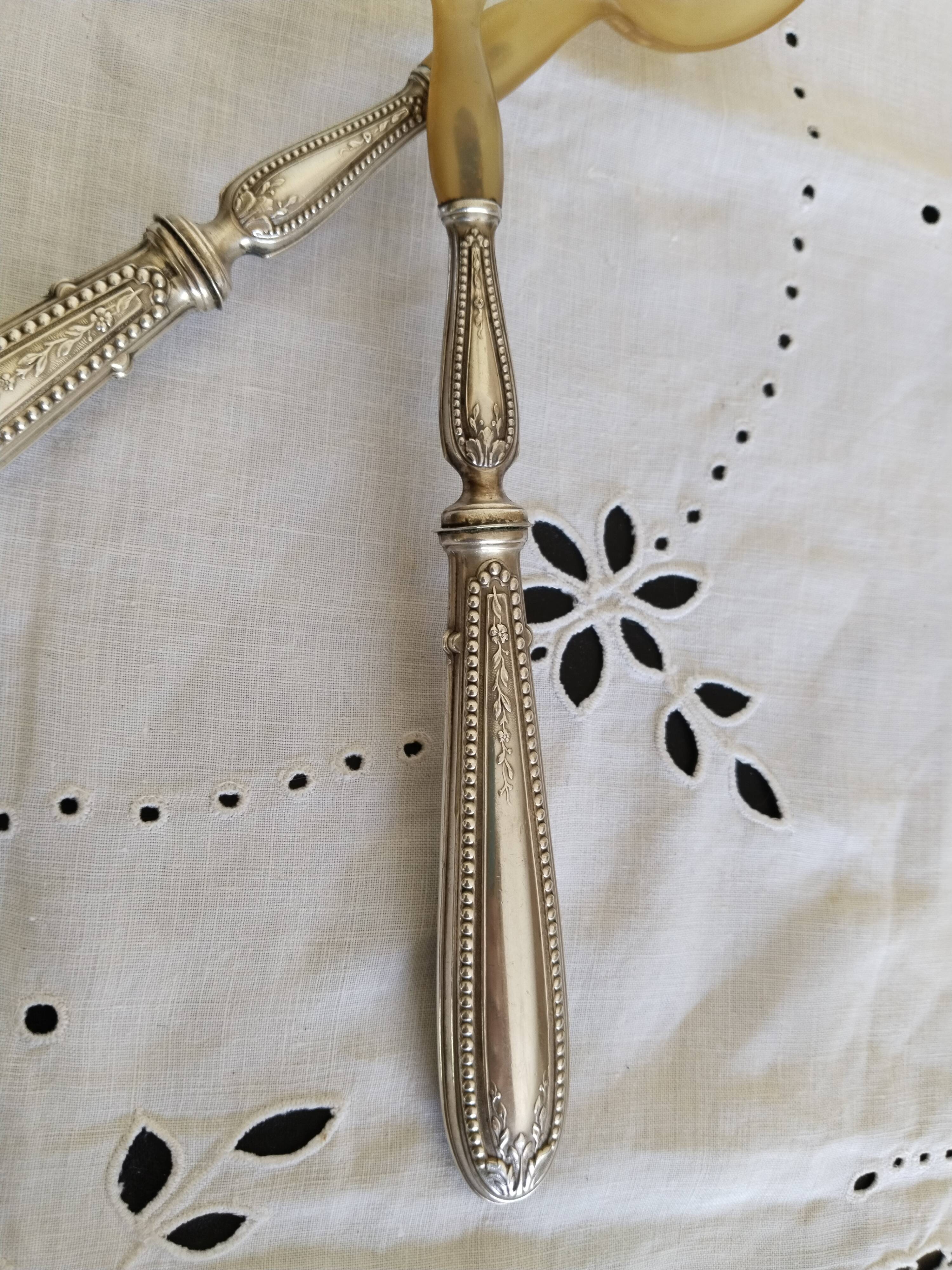 Salad servers in horn and silver metal