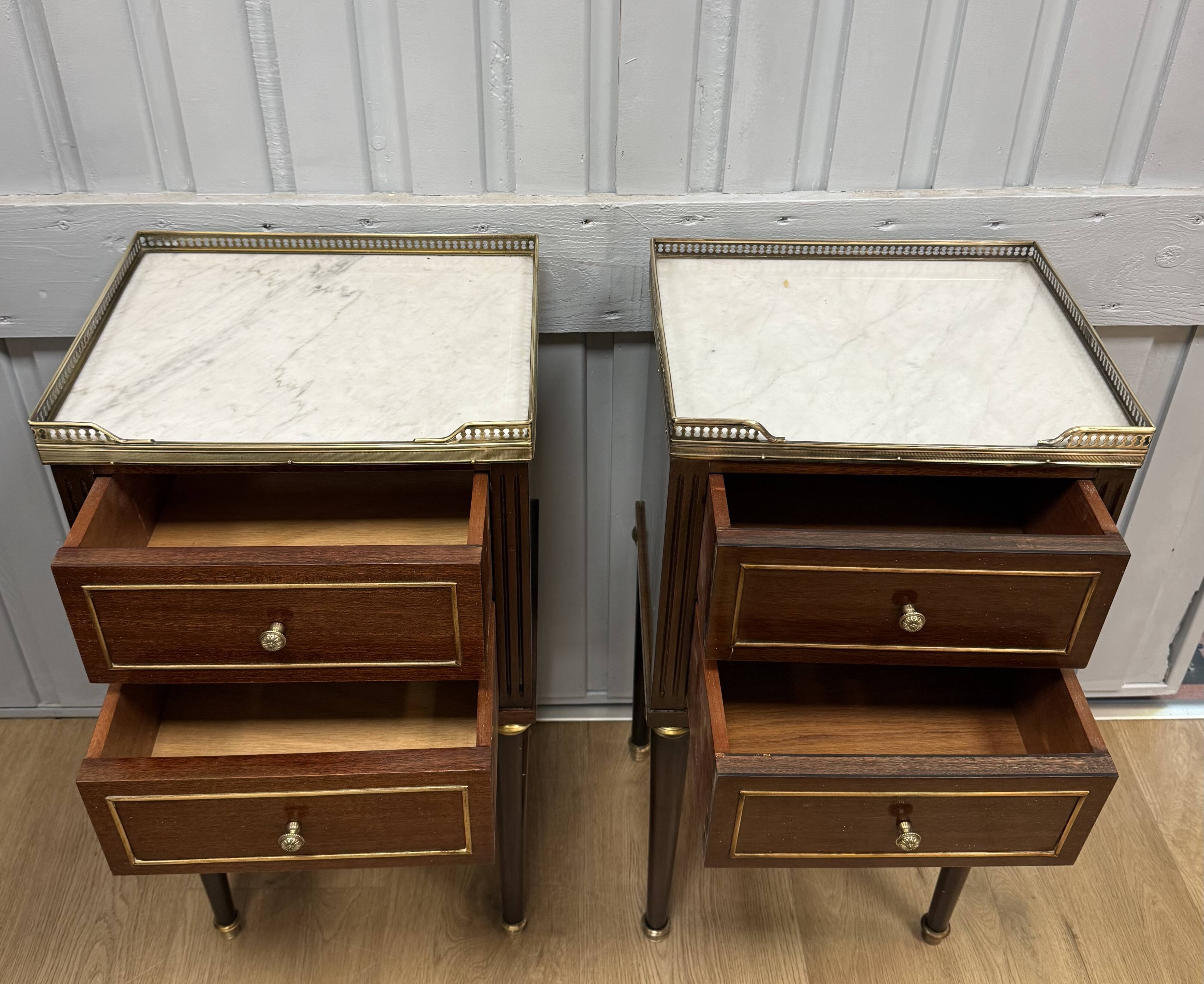 Pair of Louis XVI style bedside tables in mahogany