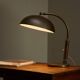 Modernist desk lamp in patinated brass from the 1930s.