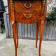 Old oval bedside table in rosewood marquetry Louis XV style