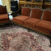 Baroque living room in burgundy velvet and wood