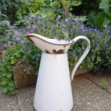 White enamelled pitcher