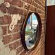 Vintage round teak mirror