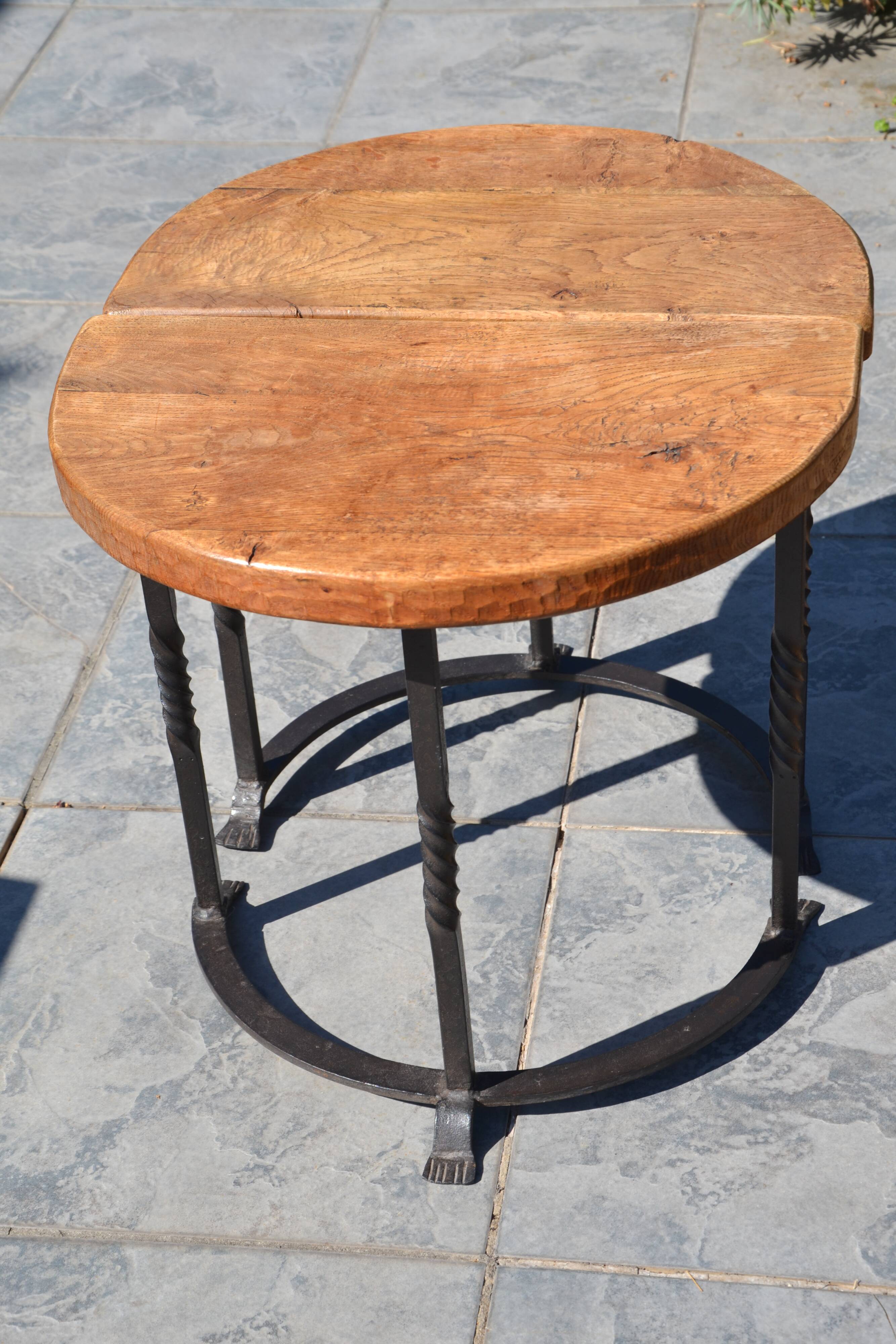Unusual modular coffee table in oak and wrought iron.