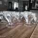 Lot de 11 coupes à champagne en verre ancien ciselé décor floral sur pied bas