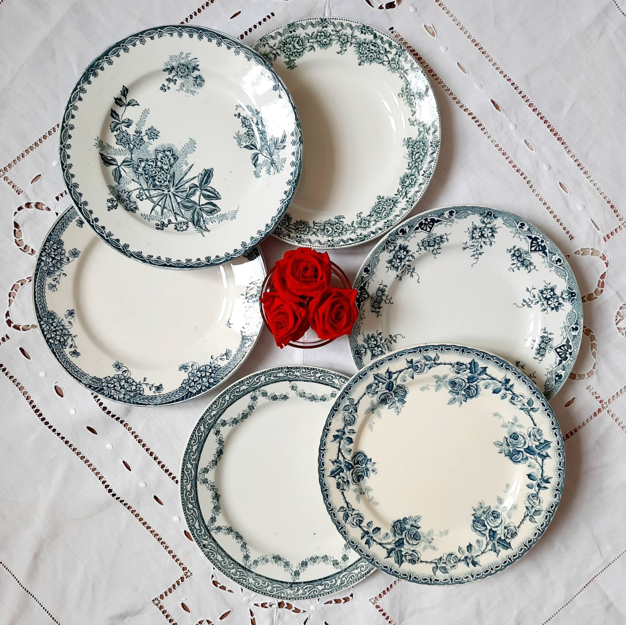 Old flat plates mismatched in iron earth accompanied by a serving dish