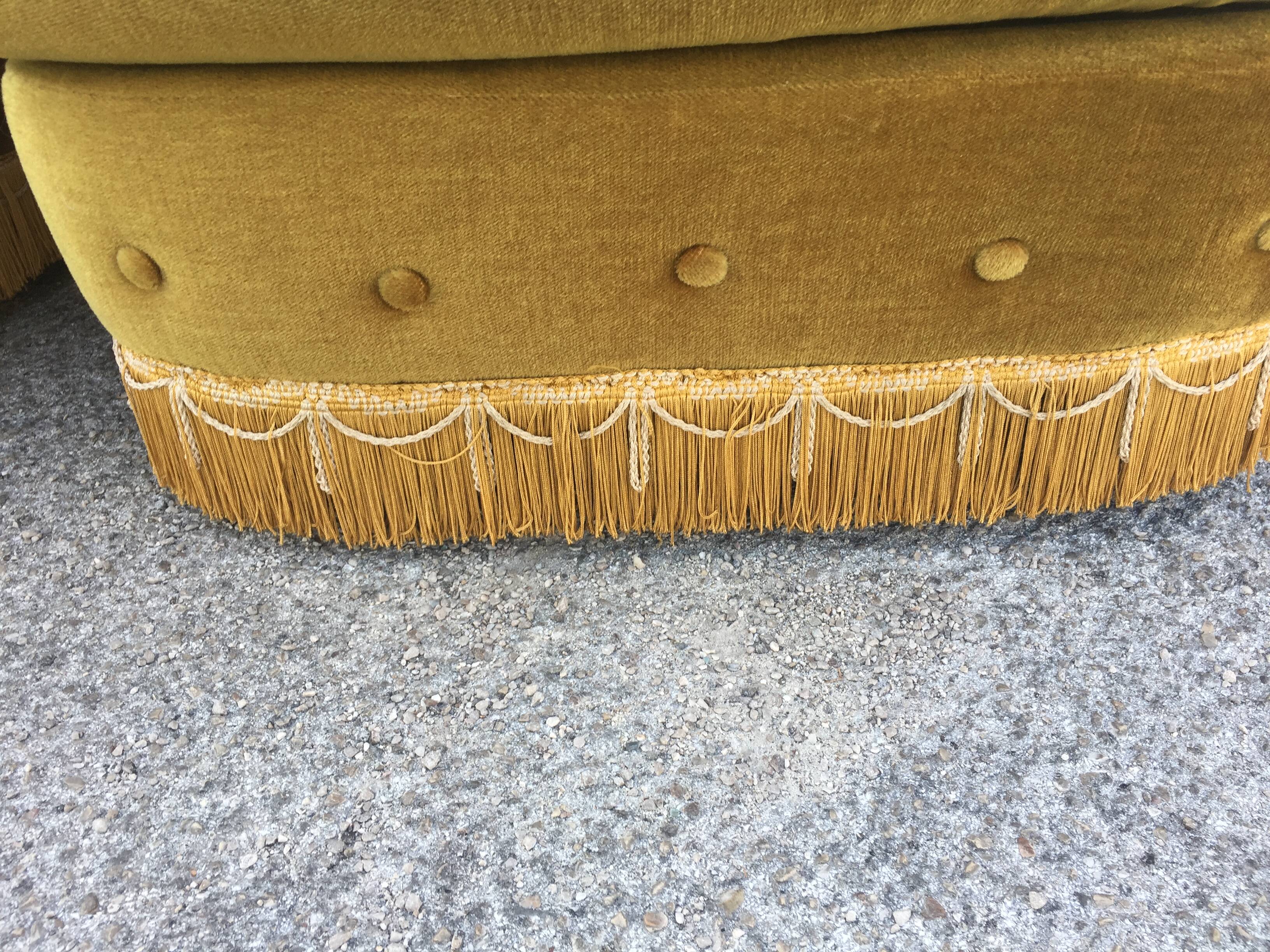 Pair of upholstered velvet armchairs