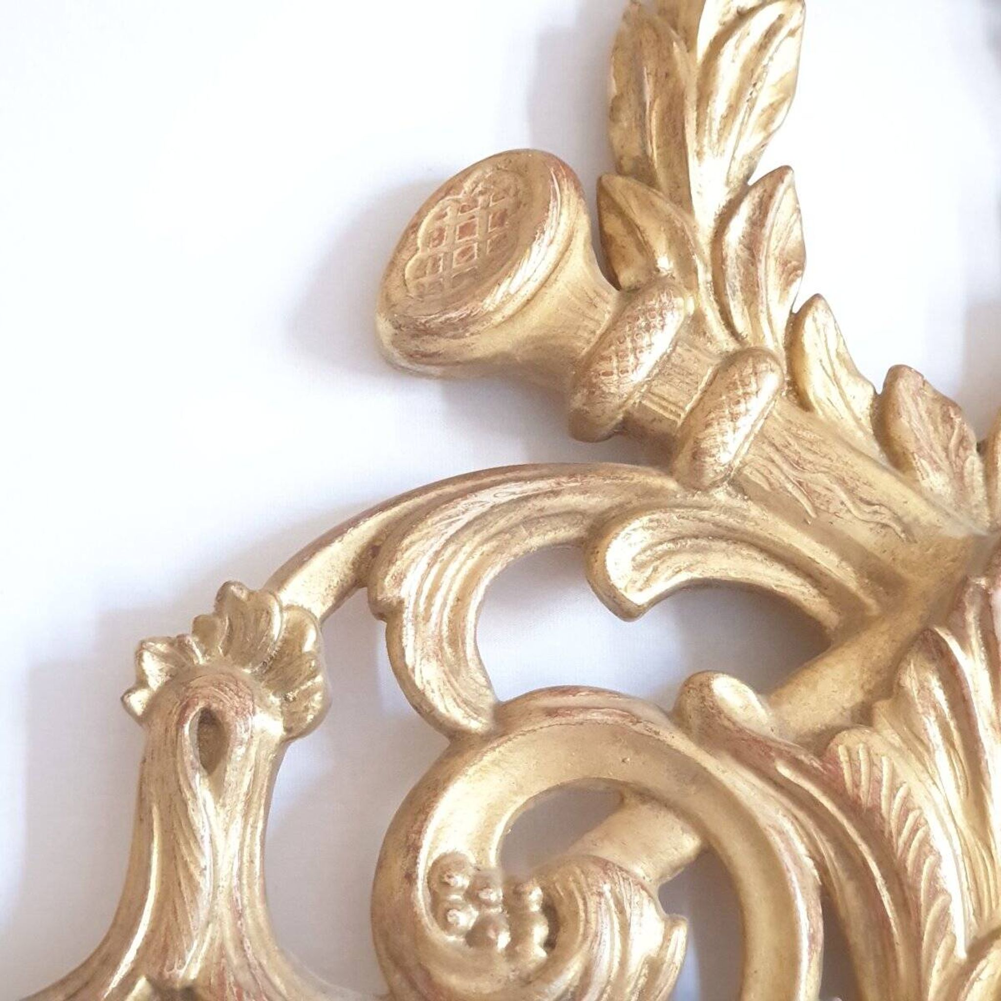 Golden mirror in the Louis XVI style from the 20th century.