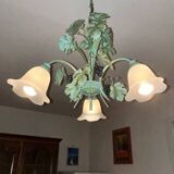 Vintage chandelier in painted metal with retro vine leaf pattern