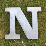Ten letters sign in zinc material