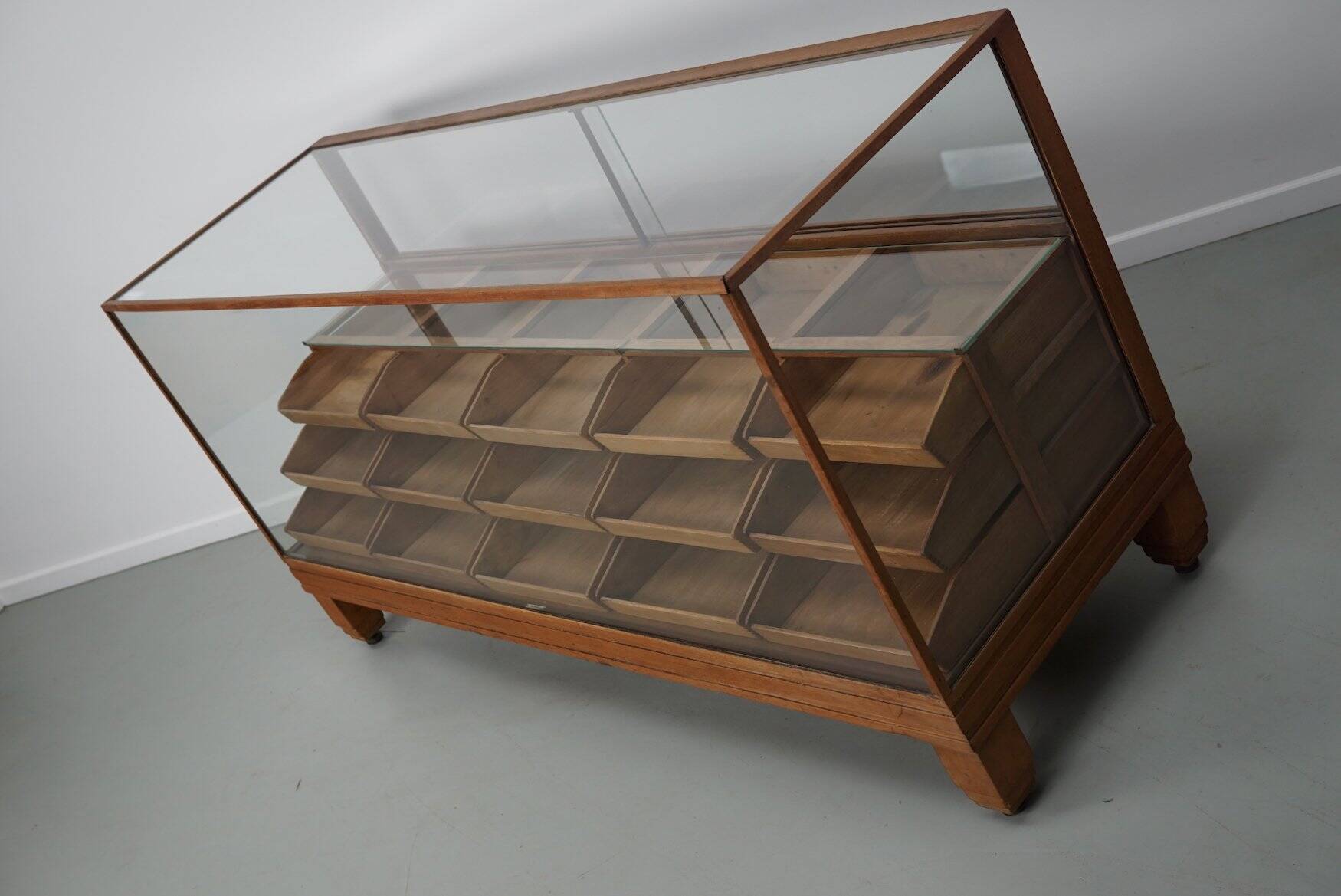 Antique British oak haberdashery cabinet, 1930s