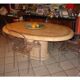 Ovoid table in pink and green travertine, circa 1975