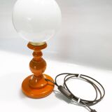 Vintage lamp in orange turned wood and opaline globe