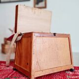 Old fisherman's stool with red seat