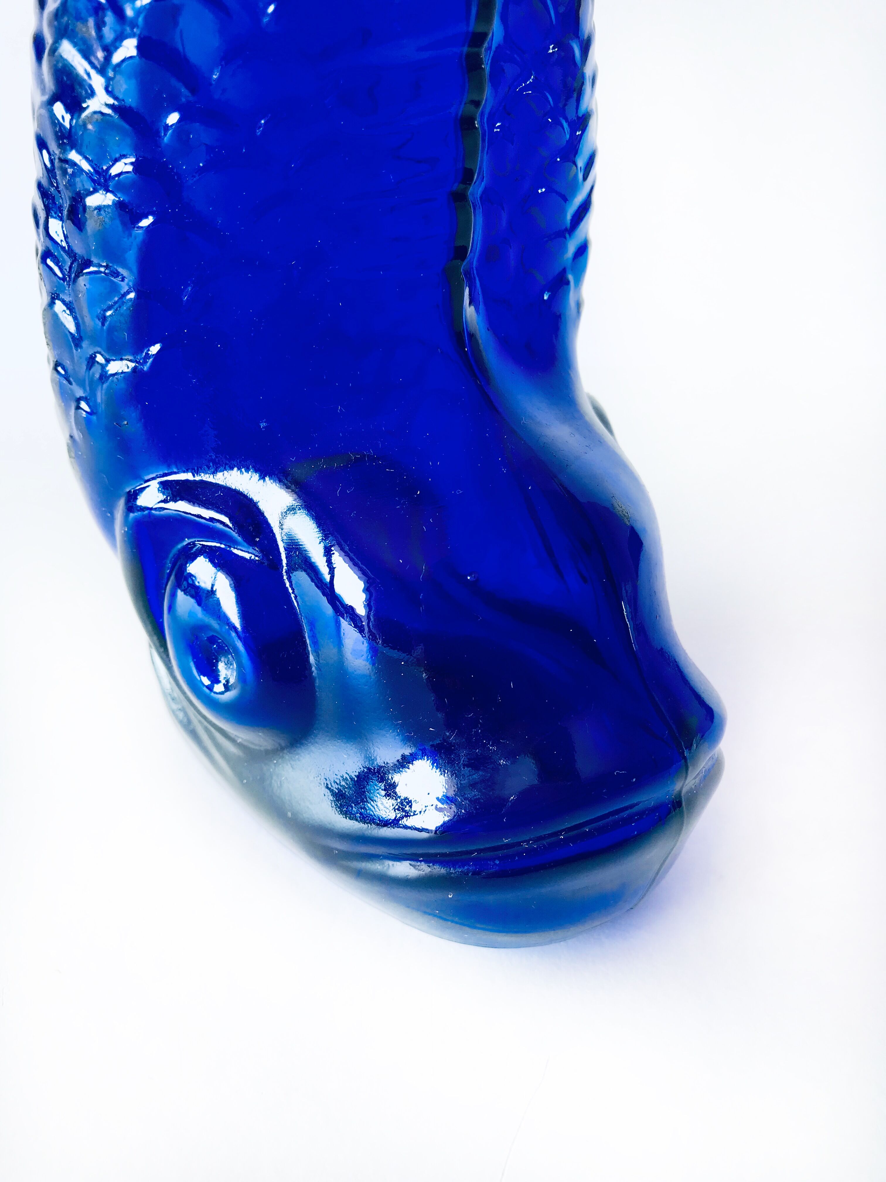Blue glass fish vase