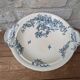 Shallow round plate Boch Frères model Regent with arabesque and foliage decoration.