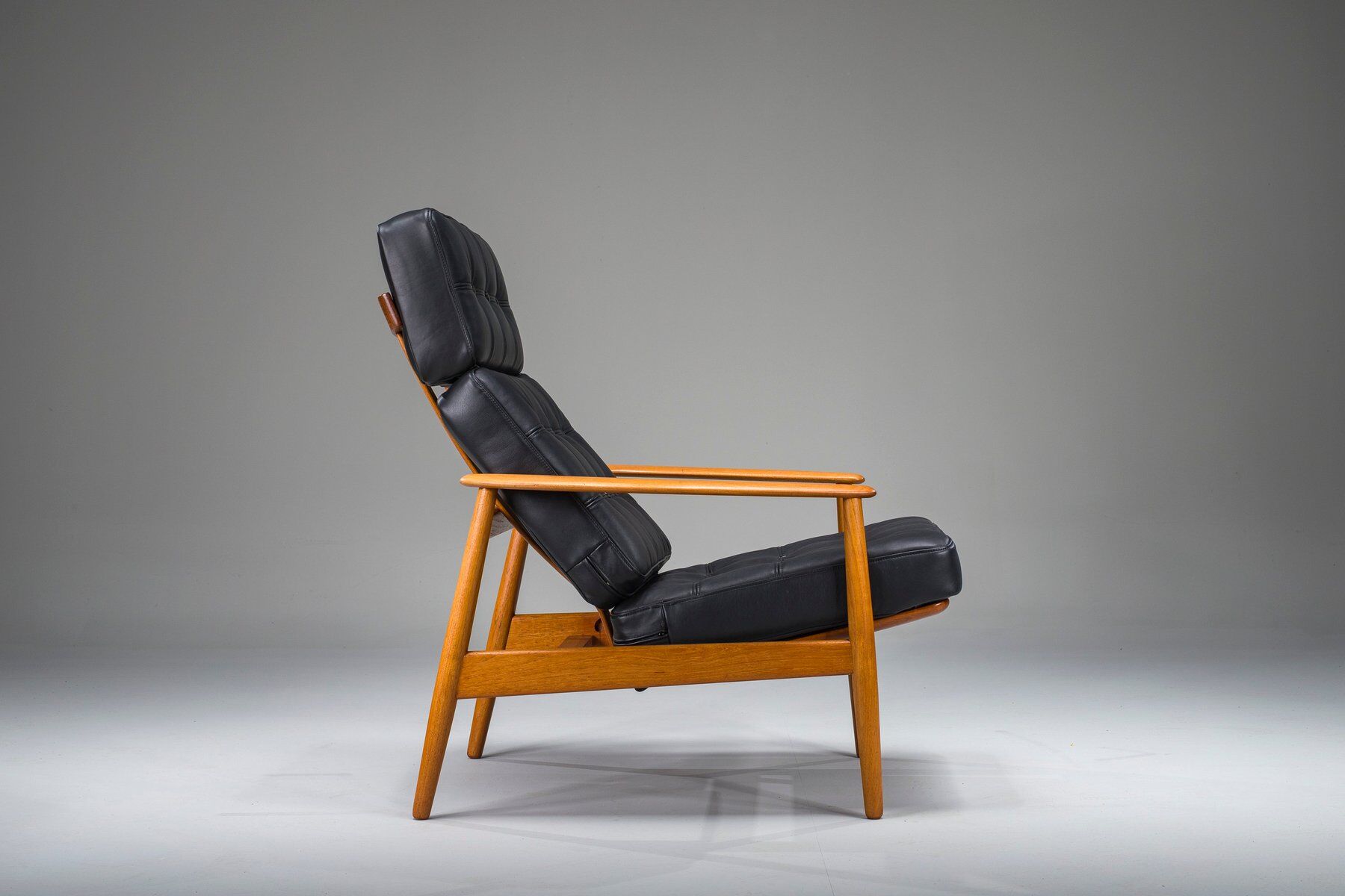 Armchair with Model FD 164 frame by Arne Vodder and Model 118 armrests by Grete Jalk in teak and black leather, Denmark, 1960s