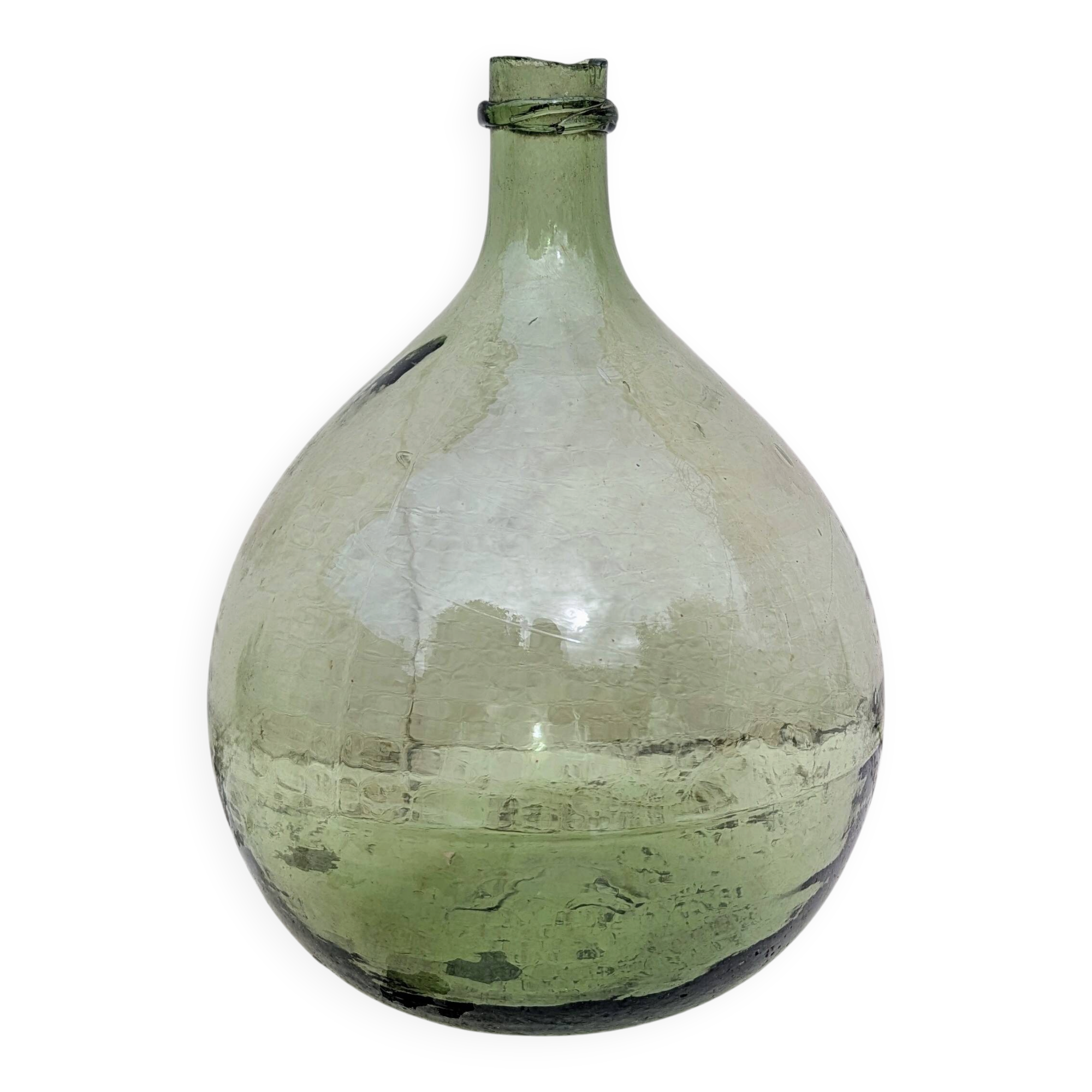 Give me a green glass jug made of blown glass.