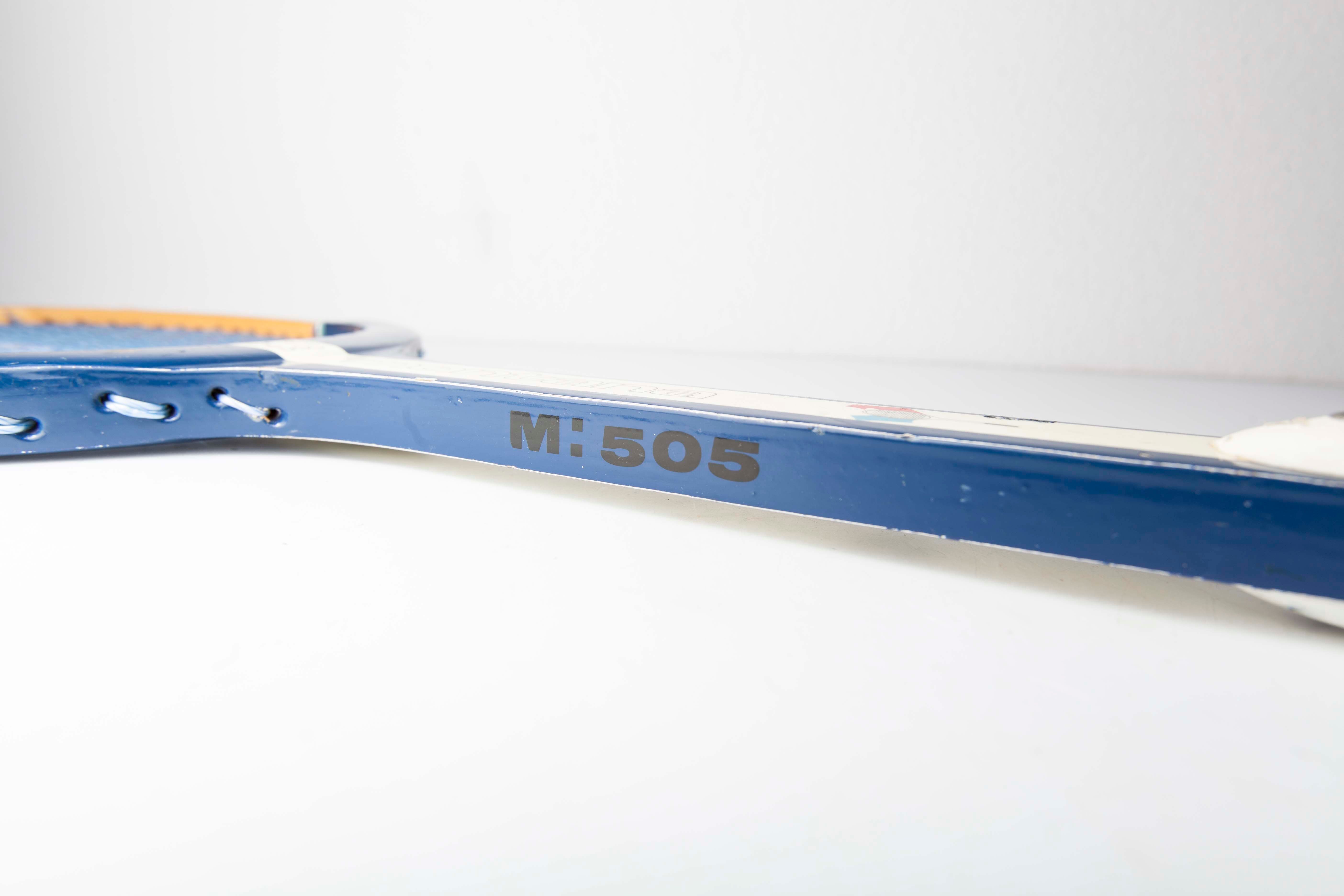 Blue Montana M505 racket with leather bag