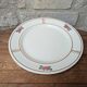 Round service plate in Iron Earth Salins model Nénuphar 29cm