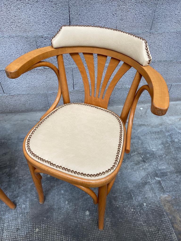 Pair of vintage curved wood restaurant armchairs
