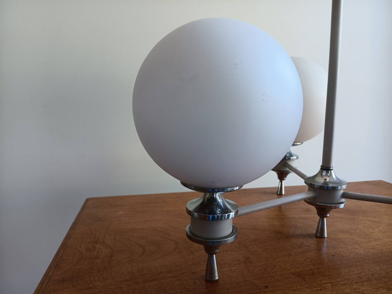 White ball and metal chandelier