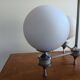 White ball and metal chandelier